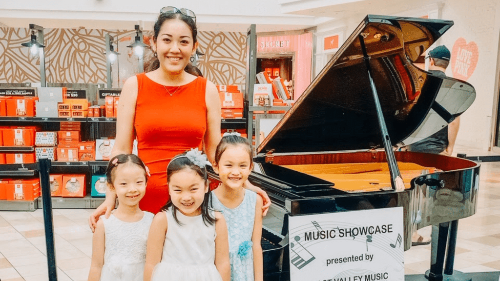 Sherin Moustafa with 3 young piano students