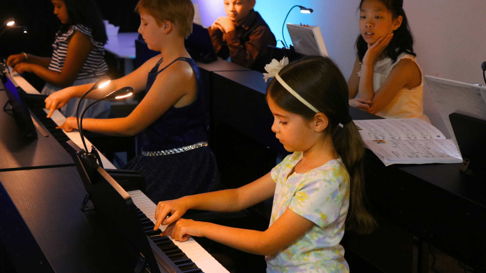 Young students in piano class